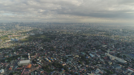 Aerial view of Manila city with skyscrapers and buildings. Philippines, Luzon. Aerial skyline of Manila.