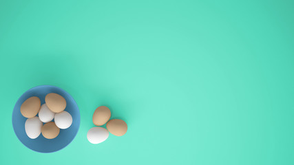 Chicken eggs into a blue cup on the table, turquoise background with copy space, breakfast easter food concept idea, top view