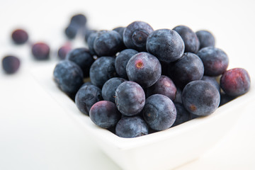 Blueberries on white background.