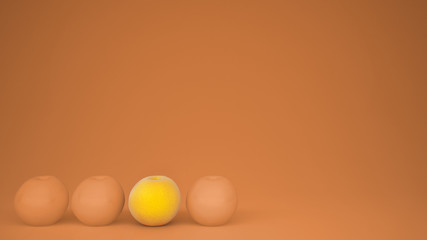 Outstanding OGM free orange contrasts with orange oranges on pastel background with copy space, natural healthy fruit concept idea