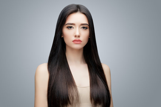 Brunette asian girl with long straight hair