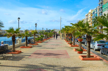 Malta, town of Sliema. December 14, 2013. Walking pedestrian road along the coast.