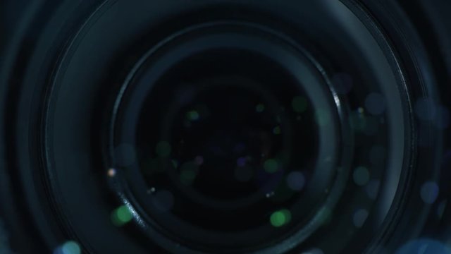 Close up of camcorder lens zooming, modern digital camera optical element