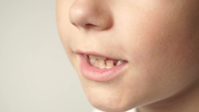 Child smiles after short talking.