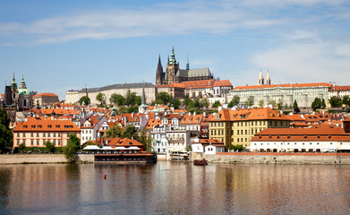 Fototapeta na wymiar View of the Prague Castle and St. Vitus Cathedral from the Vltava and Charles Bridge, Prague, Czech Republic