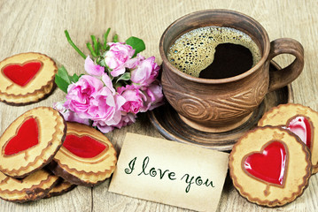 I love you. morning coffee and biscuits with a heart. congratulations on Valentine's Day. © Oleksii