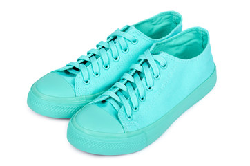 Turquoise rubber sneakers, casual footwear isolated on white background
