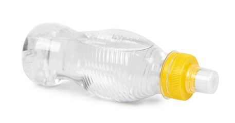 Transparent water bottle with yellow cap isolated on white background
