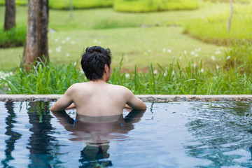 man playing in the swimming pool