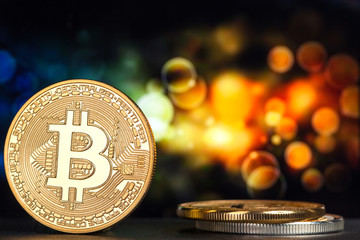 bitcoin on a multicolored blurred background