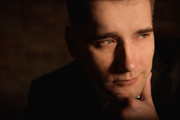 Obraz premium Successful businessman portrait indoor in a modern studio.