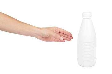 White plastic milk bottle with hand isolated on white background