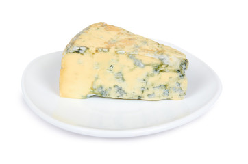 Piece of milky blue cheese, isolated on white background