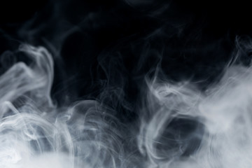 Make smoke from incense.  Black background