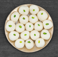 Indian Sweet Rasgulla Also Know as Rosogolla, Roshogolla, Rasagola, Ras Gulla, Anguri Rasgulla or Angoori Rasgulla is a Syrupy Dessert Popular in India. It is Made From Ball Shaped Dumplings.