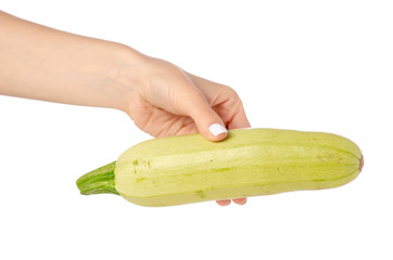 Zucchini in hand on white background isolation