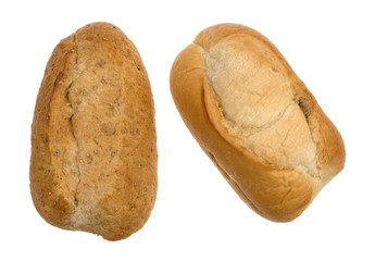 Top view of two small whole wheat and white bread loaves isolated on a white background.