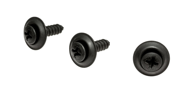 Three black trim head screws isolated on a white background.
