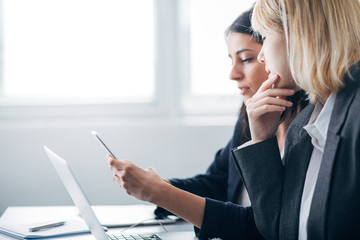 Colleagues working in office