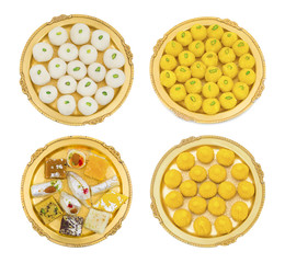 Collection of Indian Sweet Food Rasgulla, Coconut Laddu, MIx Sweets or Modak Laddu in Golden Plate Isolated on White Background