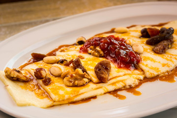 Grilled cheese with honey and nuts, typical dessert of the Canary Islands, Spain