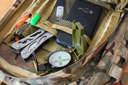 Compass, multitool in a backpack