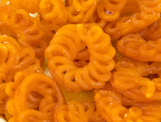 Indian Traditional Sweet Imarti Also Know as Amriti, Omriti, Jahangir, Jalebi, Jaangiri. It is Mde by Deep-Frying Vigna Mungo Flour Batter in a Kind of Circular Flower Shape.