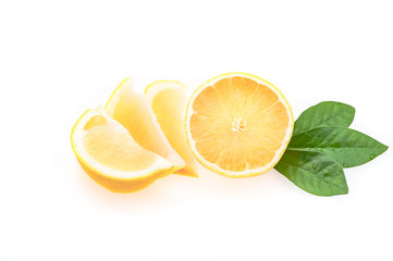 Half a fresh, clean, glowing lemon with green leaves and several cut slices on a white background. isolated.