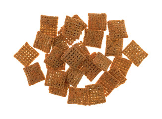 Cheddar cheese wheat square crisps on a white background.