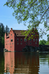 Fototapeta na wymiar Red Castle on the Lake