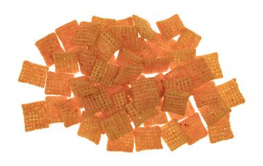 Top view of a portion of cheddar cheese crispy rice crackers on a white background.
