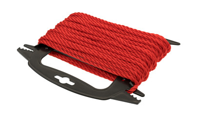 Red polypropylene rope on a plastic winder isolated on a white background.