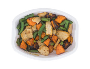 Top view of a cooked roasted turkey TV dinner isolated on a white background.