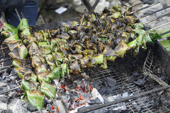Satar or sata is an exotic food very popular in peninsular Malaysia. It is made of raw fish and coconut, wrapped in fresh banana leaf. It has to be roasted before served.