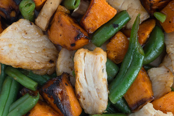 Close view of a roasted turkey TV dinner illuminated with natural light.