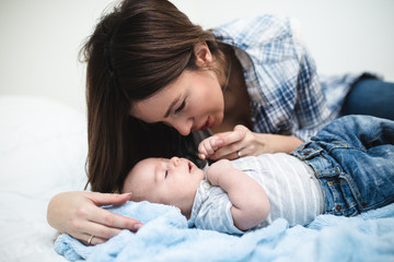 Mother enjoying and relaxing with her baby boy. 