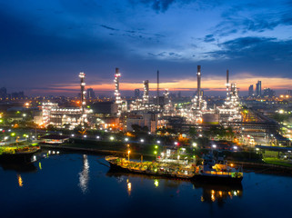 Fototapeta na wymiar Aerial view of twilight of oil refinery ,Shot from drone of Oil refinery and Petrochemical plant at dusk , Bangkok, Thailand