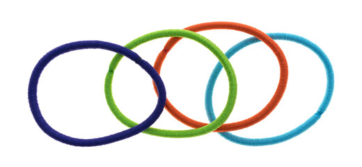 Group of ponytail holders on a white background top view.