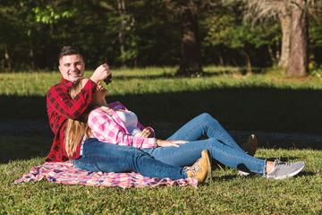 Couple having picnic at park