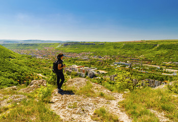 Young lady looking at beautiful landscape