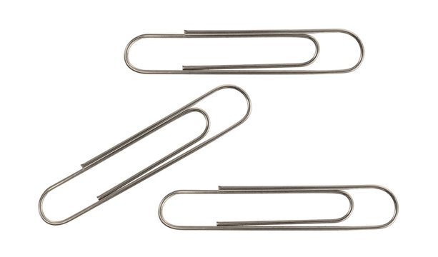 Top view of three metal paper clips on a white background.