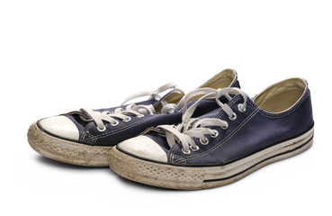 Old blue sneaker isolated on white