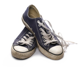 Old blue sneaker isolated on white