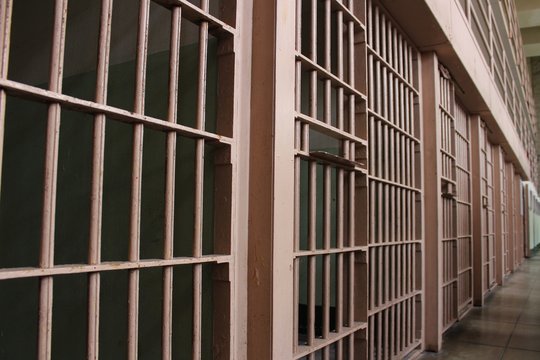 Beige jail cell bars
