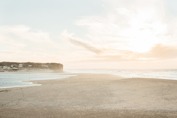 Beach in the evening, sand and sky of pastel tones, background