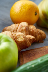Ingredients for school lunch and plastic container on the table, close-up, selective focus
