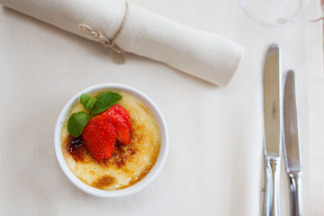 cream brulee with strawberry and mint - 205672944