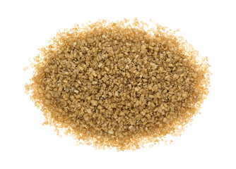Top view of a portion of gold sugar on a white background.