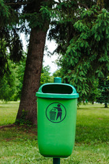 Green trash in the park