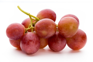 Ripe red grape isolated on white.